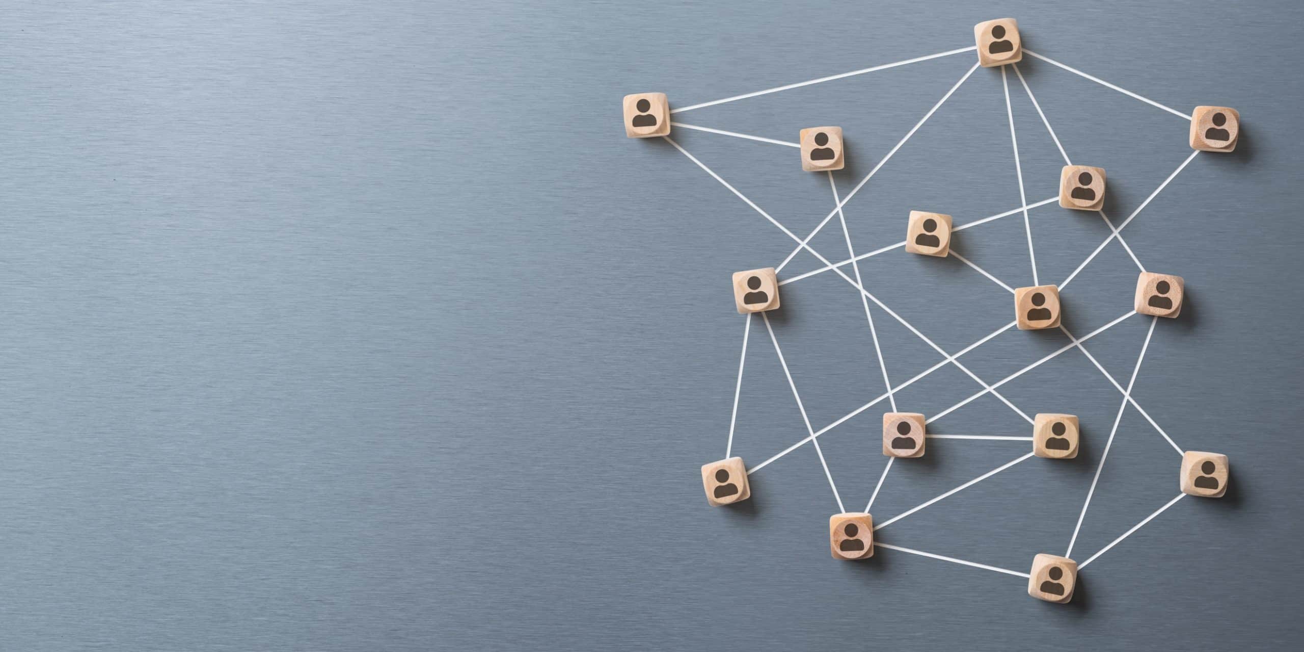 Illustration of a network using wooden blocks and string