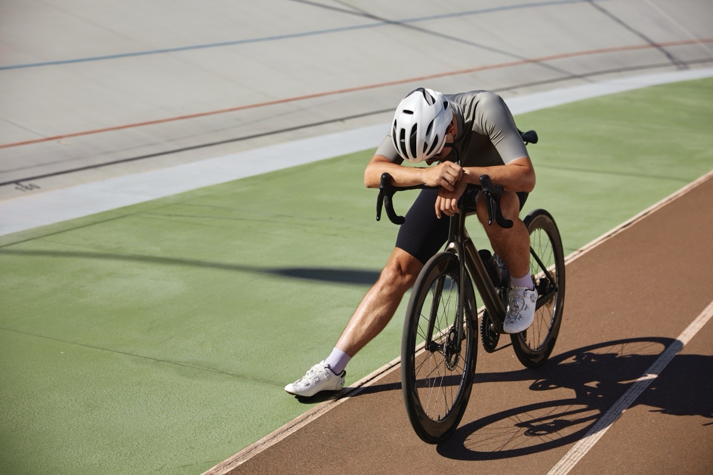 A person on a bicycle AI-generated content may be incorrect.
